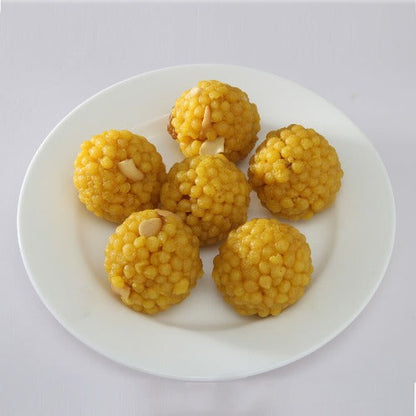 https://cdn.shopify.com/s/files/1/1857/6931/products/Dadu_sAnnamayyaLaddu.jpg?v=1716984967