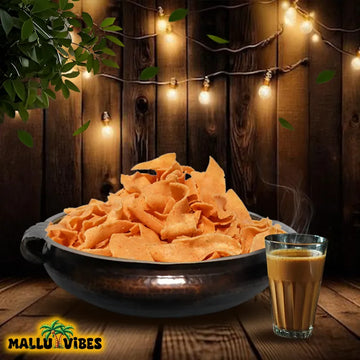 https://cdn.shopify.com/s/files/1/1857/6931/files/Front_view_of_Authentic_Kerala_snacks_pakkavada_in_a_bowl_english_-_Homemade_Kerala_snacks_ribbon_shaped_pakkoda.webp?v=1746526935