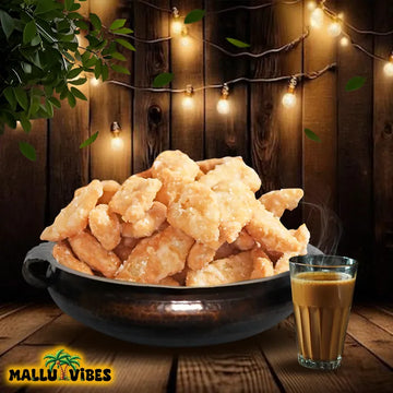 https://cdn.shopify.com/s/files/1/1857/6931/files/Front_view_of_Best_Kerala_snacks_online_diamond_chips_sweet_in_a_bowl_english_-_Organic_Kerala_snacks_sugar_coated_diamond_sweet_cuts.webp?v=1746527733