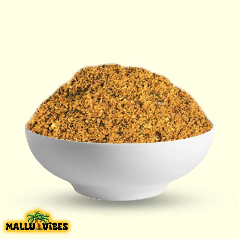 https://cdn.shopify.com/s/files/1/1857/6931/files/Front_view_of_Mallu_Vibes_Netholi_Chammanthi_Podi_with_Homemade_Fresh_and_No_Preservatives_a_tangy_and_spicy_flavor_english_-_anchovy_chutney_powder_chammanthi_podi_with_bowl.webp?v=1767007078