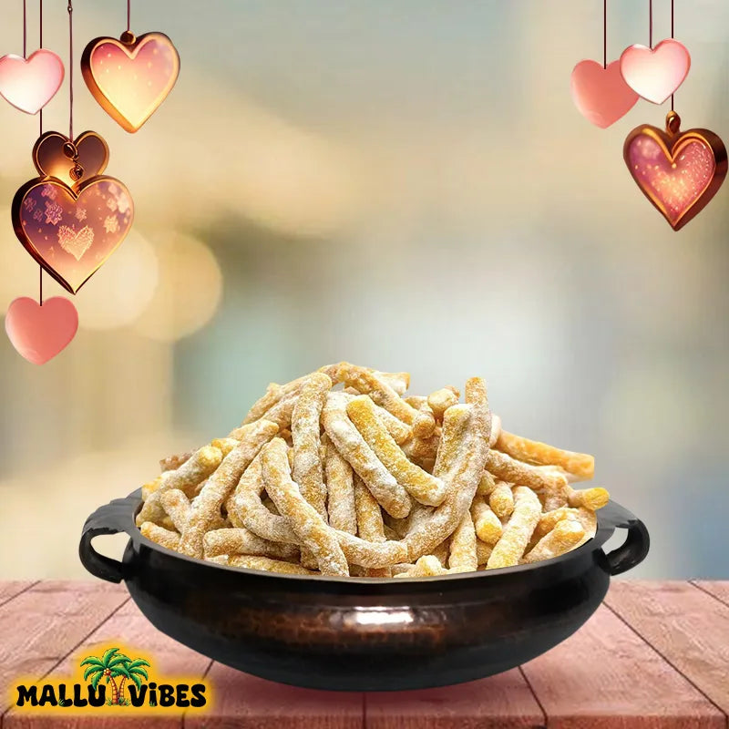 https://cdn.shopify.com/s/files/1/1857/6931/files/Front_view_of_Mallu_Vibes_Organic_Kerala_snacks_madhura_seva_in_a_bowl_english_-_sweet_sev_Buy_Kerala_Snacks_Online.webp?v=1767007633