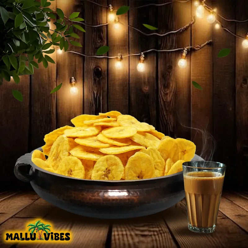 https://cdn.shopify.com/s/files/1/1857/6931/files/Front_view_of_crispy_Mallu_Vibes_golden_Homemade_Fresh_banana_chips_in_a_bowl_malayalam_-_nendran_chips_Natural_Kerala_snacks.webp?v=1746525683