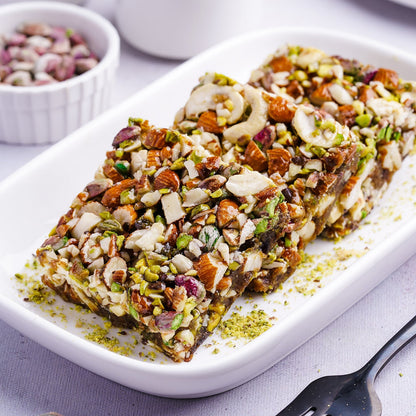 https://cdn.shopify.com/s/files/1/1857/6931/files/GourmetBaklavaFNP18_2.jpg?v=1762321552