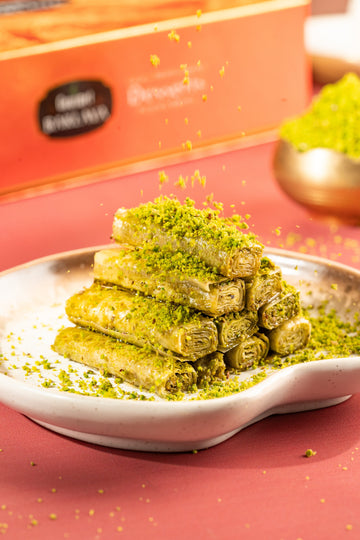https://cdn.shopify.com/s/files/1/1857/6931/files/GourmetBaklava_Eid202500285_349b8c84-a32d-48be-a553-9049489e9362.jpg?v=1762321270