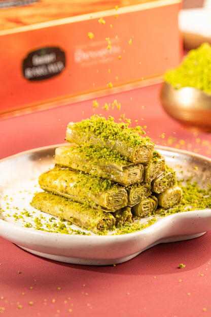 https://cdn.shopify.com/s/files/1/1857/6931/files/GourmetBaklava_Eid202500285_349b8c84-a32d-48be-a553-9049489e9362.jpg?v=1762321270