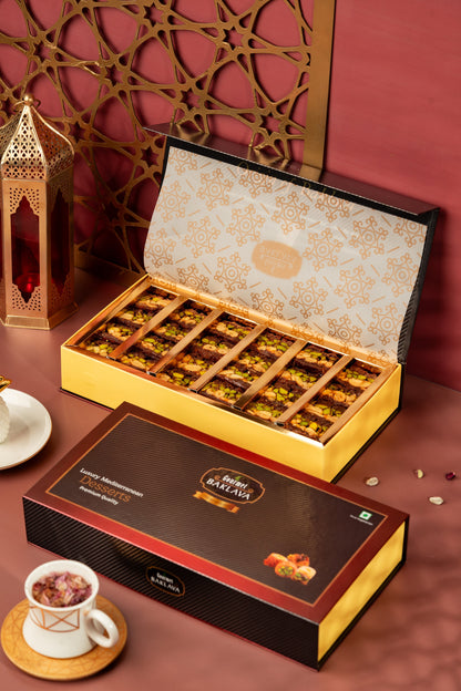 https://cdn.shopify.com/s/files/1/1857/6931/files/GourmetChocolateCashewPistachioBaklava350gms.jpg?v=1762321616