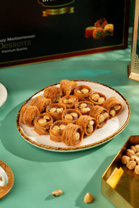 https://cdn.shopify.com/s/files/1/1857/6931/files/GourmetHalzelnutNestBaklava.jpg?v=1762321480