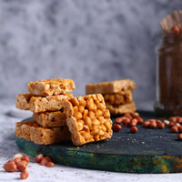 https://cdn.shopify.com/s/files/1/1857/6931/files/GroundNutChikki3.jpg?v=1765199158