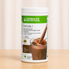 https://cdn.shopify.com/s/files/1/1857/6931/files/HerbalifeFormula1NutritionalShakeMix-ChocolateFlavour.png?v=1776688787