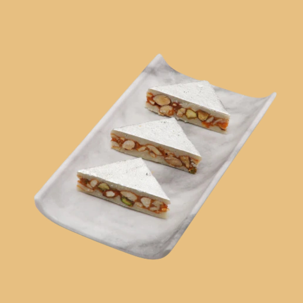 https://cdn.shopify.com/s/files/1/1857/6931/files/KajuDryFruitKatli.jpg?v=1784886965