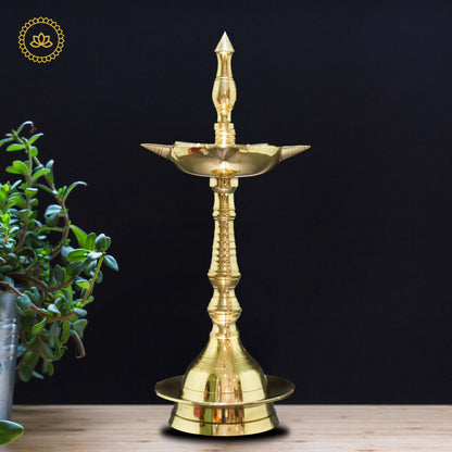 https://cdn.shopify.com/s/files/1/1857/6931/files/KeralaDeepaBrass8.5_MC00003.jpg?v=1762390116