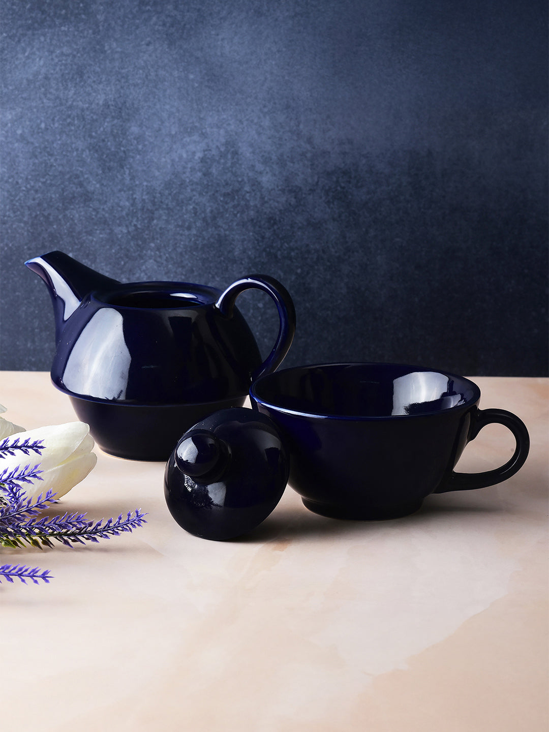 https://cdn.shopify.com/s/files/1/1857/6931/files/Midnight_Pour_Tea_Set_8.jpg?v=1770815916