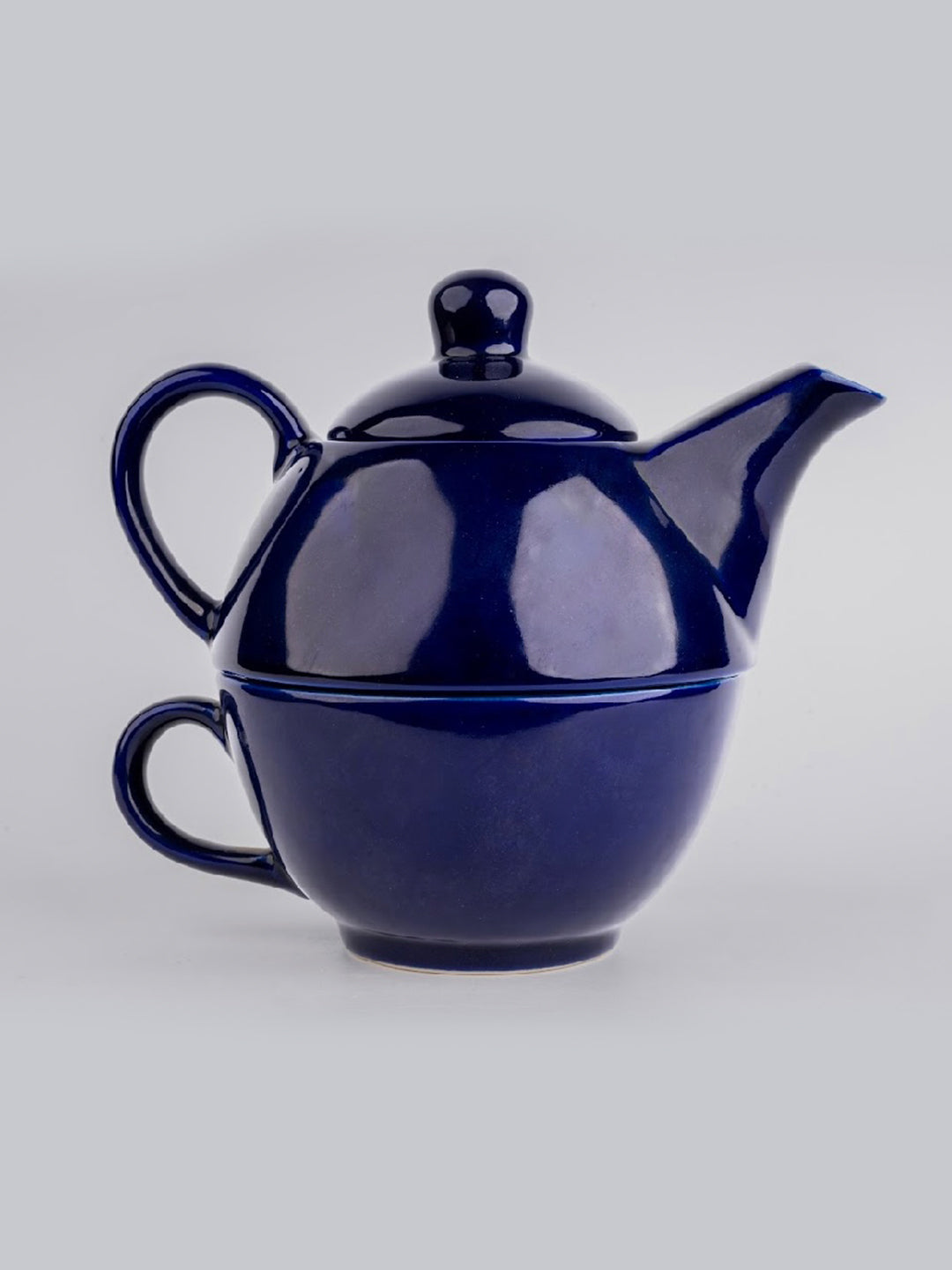 https://cdn.shopify.com/s/files/1/1857/6931/files/Midnight_Pour_Tea_Set_for_One-1.jpg?v=1770815892