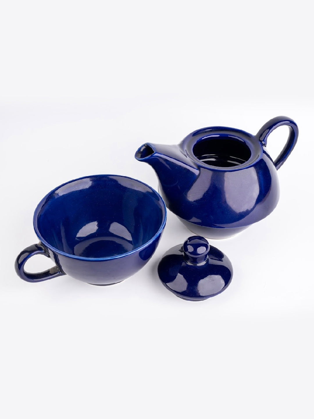 https://cdn.shopify.com/s/files/1/1857/6931/files/Midnight_Pour_Tea_Set_for_One_3.jpg?v=1770815892