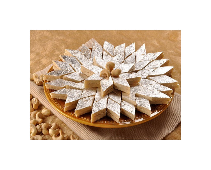 https://cdn.shopify.com/s/files/1/1857/6931/products/MithaiwalaKajuBurfi.jpg?v=1623475618