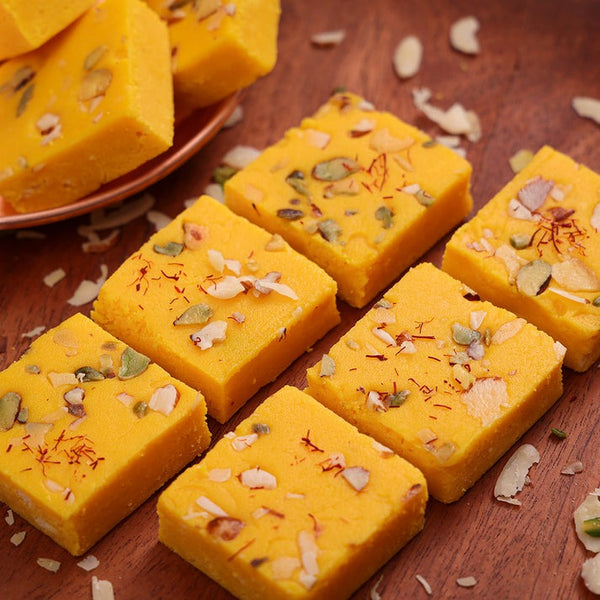 https://cdn.shopify.com/s/files/1/1857/6931/files/MithaiwalaKesarDryFruitBurfi.jpg?v=1716900821