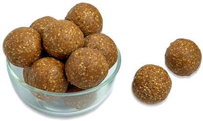 https://cdn.shopify.com/s/files/1/1857/6931/products/NuvvulaLaddu.jpg?v=1621427736
