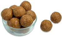 https://cdn.shopify.com/s/files/1/1857/6931/products/NuvvulaLaddu.jpg?v=1621427736