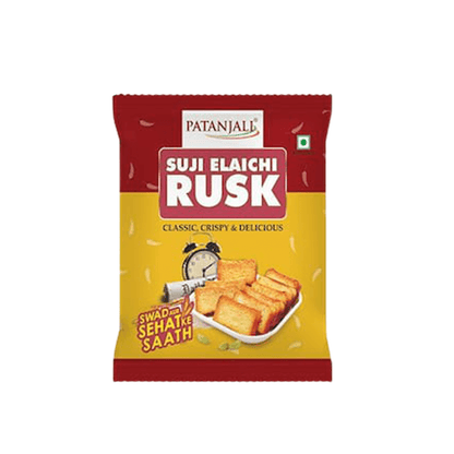 https://cdn.shopify.com/s/files/1/1857/6931/products/Patanjali-Suji-Elaichi-Rusk.png?v=1603714889