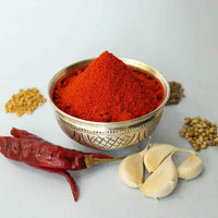 https://cdn.shopify.com/s/files/1/1857/6931/products/PullaReddyKuraKaram_CurryPowder.jpg?v=1710415504
