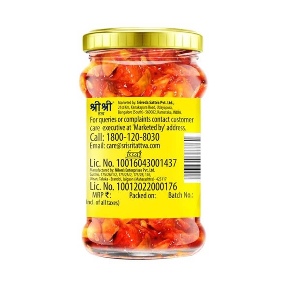 https://cdn.shopify.com/s/files/1/1857/6931/products/SriSriTattvaLemonPickle300g.jpg?v=1622200617