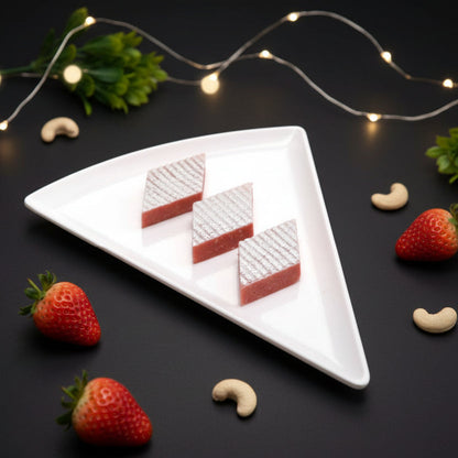 https://cdn.shopify.com/s/files/1/1857/6931/files/StrawberryKajuKatli.jpg?v=1784886965
