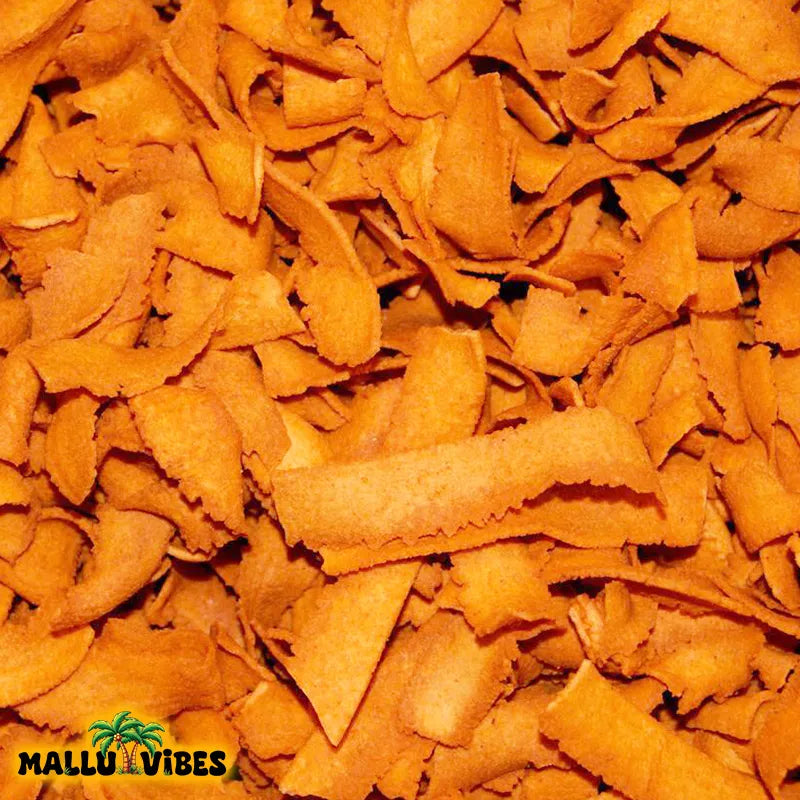 https://cdn.shopify.com/s/files/1/1857/6931/files/Top_view_of_Authentic_Kerala_snacks_pakkavada_in_a_bowl_english_-_Homemade_Kerala_snacks_ribbon_shaped_pakkoda.webp?v=1746526935