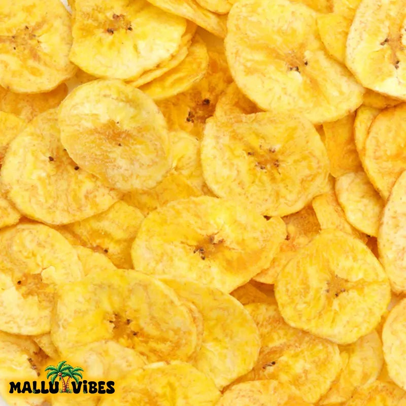 https://cdn.shopify.com/s/files/1/1857/6931/files/Top_view_of_Freshly_Made_Kerala_snacks_package_with_bowl_for_Banana_chips_malayalam_-_Organic_Kerala_snacks_nendran_chips.webp?v=1767011874
