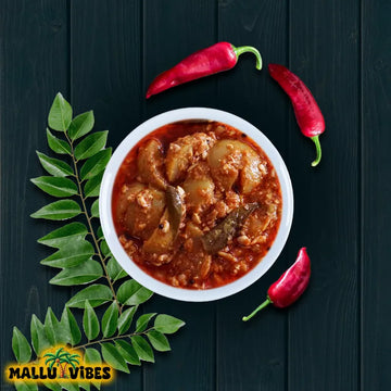 https://cdn.shopify.com/s/files/1/1857/6931/files/Top_view_of_Kerala_pickles_gooseberry_pickle_sour_and_spicy_taste_Homemade_Kerala_pickles_and_No_Preservatives_malayalam_-_Homemade_Fresh_nellika_achar.webp?v=1746527641