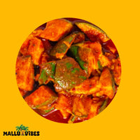 https://cdn.shopify.com/s/files/1/1857/6931/files/Top_view_of_Mallu_Vibes_Homemade_Kerala_pickles_and_No_Preservatives_Mango_pickle_with_chunks_of_ripe_mangoes_malayalam_-_mango_achar.webp?v=1746527010