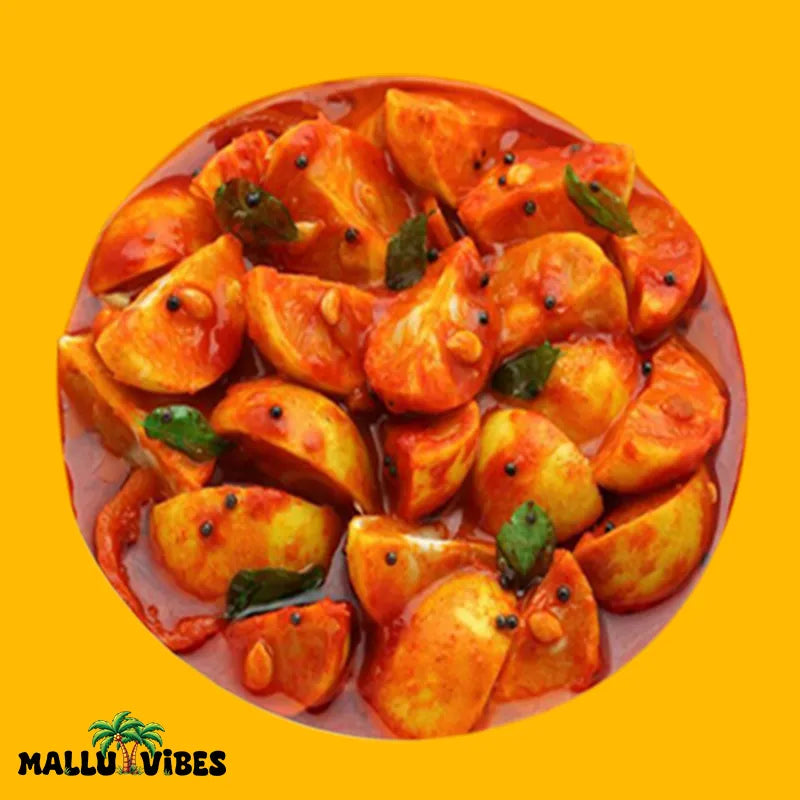 https://cdn.shopify.com/s/files/1/1857/6931/files/Top_view_of_Mallu_Vibes_lime_Kerala_pickles_with_vibrant_yellow_green_limes_Homemade_Kerala_pickles_and_No_Preservatives_malayalam_-_naranga_achar.webp?v=1746527478