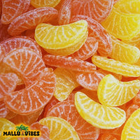 https://cdn.shopify.com/s/files/1/1857/6931/files/Top_view_of_Traditional_Kerala_food_Orange_mittai_in_a_bowl_english_-_Organic_Kerala_snacks_Orange_candy.webp?v=1746527671