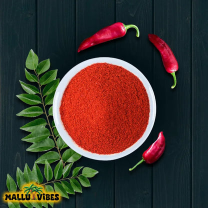https://cdn.shopify.com/s/files/1/1857/6931/files/Top_view_of_kashmiri_mulaku_podi.webp?v=1746702537