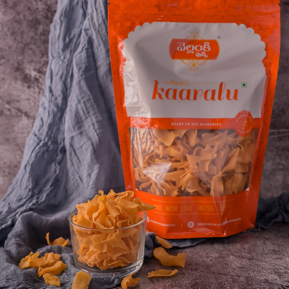 https://cdn.shopify.com/s/files/1/1857/6931/files/VellankiFoods-RibbonPakoda3.png?v=1716896522