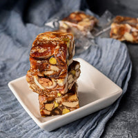 https://cdn.shopify.com/s/files/1/1857/6931/files/VellankiFoodsKarjuraBurfi.jpg?v=1716901566