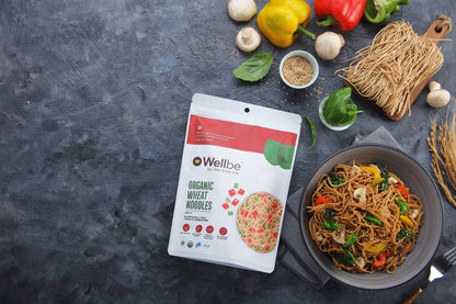 https://cdn.shopify.com/s/files/1/1857/6931/products/WellbeOrganicWheatNoodles.jpg?v=1660635067