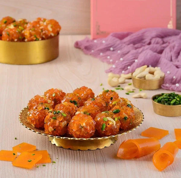 https://cdn.shopify.com/s/files/1/1857/6931/files/aam-papad-laddoo.webp?v=1763122663
