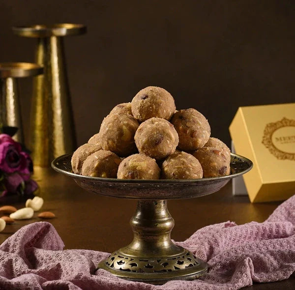 https://cdn.shopify.com/s/files/1/1857/6931/files/atta-laddoo.webp?v=1763122671