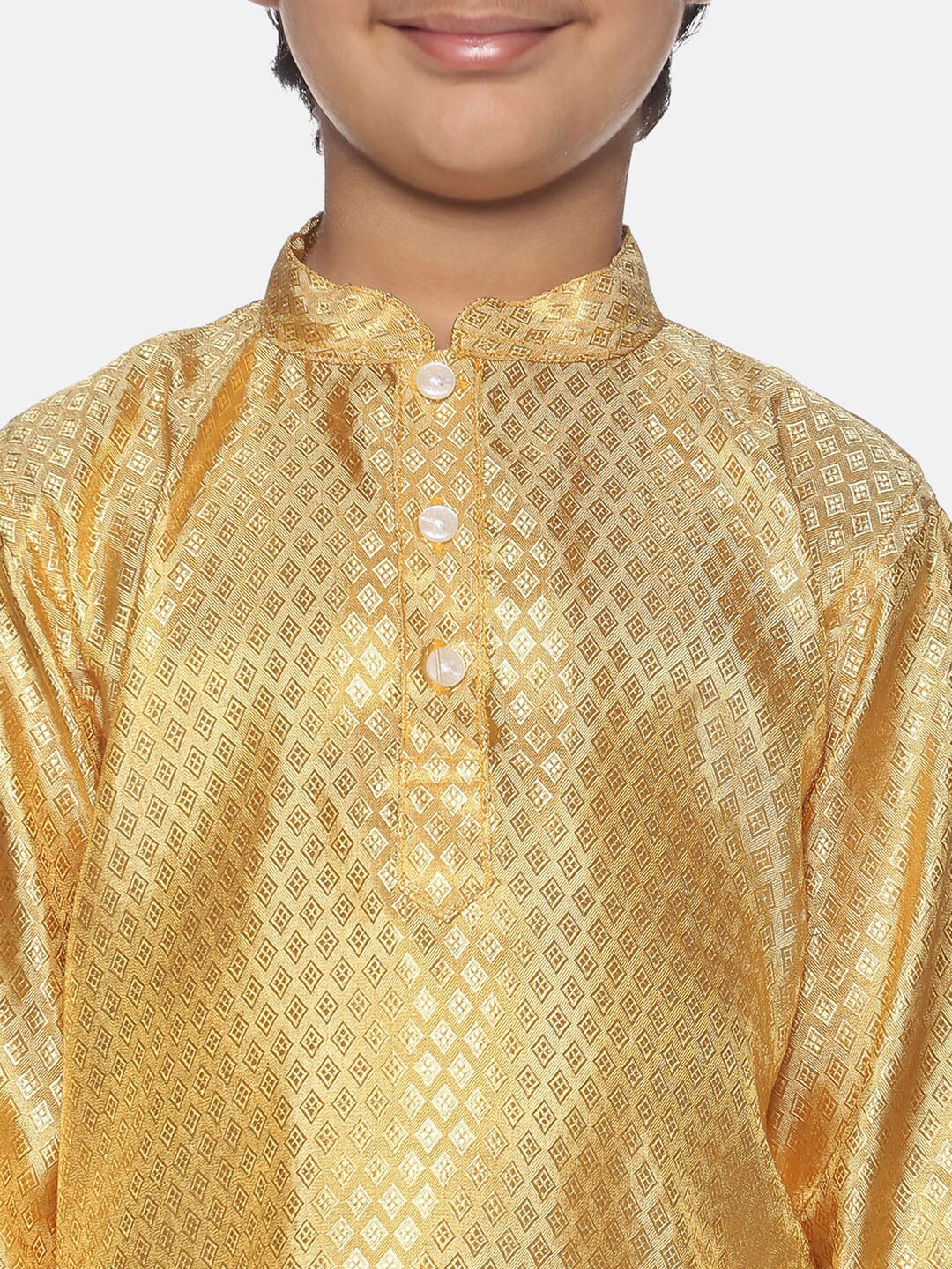 https://cdn.shopify.com/s/files/1/1857/6931/products/b335078c-d495-44f4-9cc5-387c0eccecd21639985491594SethukrishnaBoysGold-TonedKurtawithDhotiPants2.jpg?v=1661520208