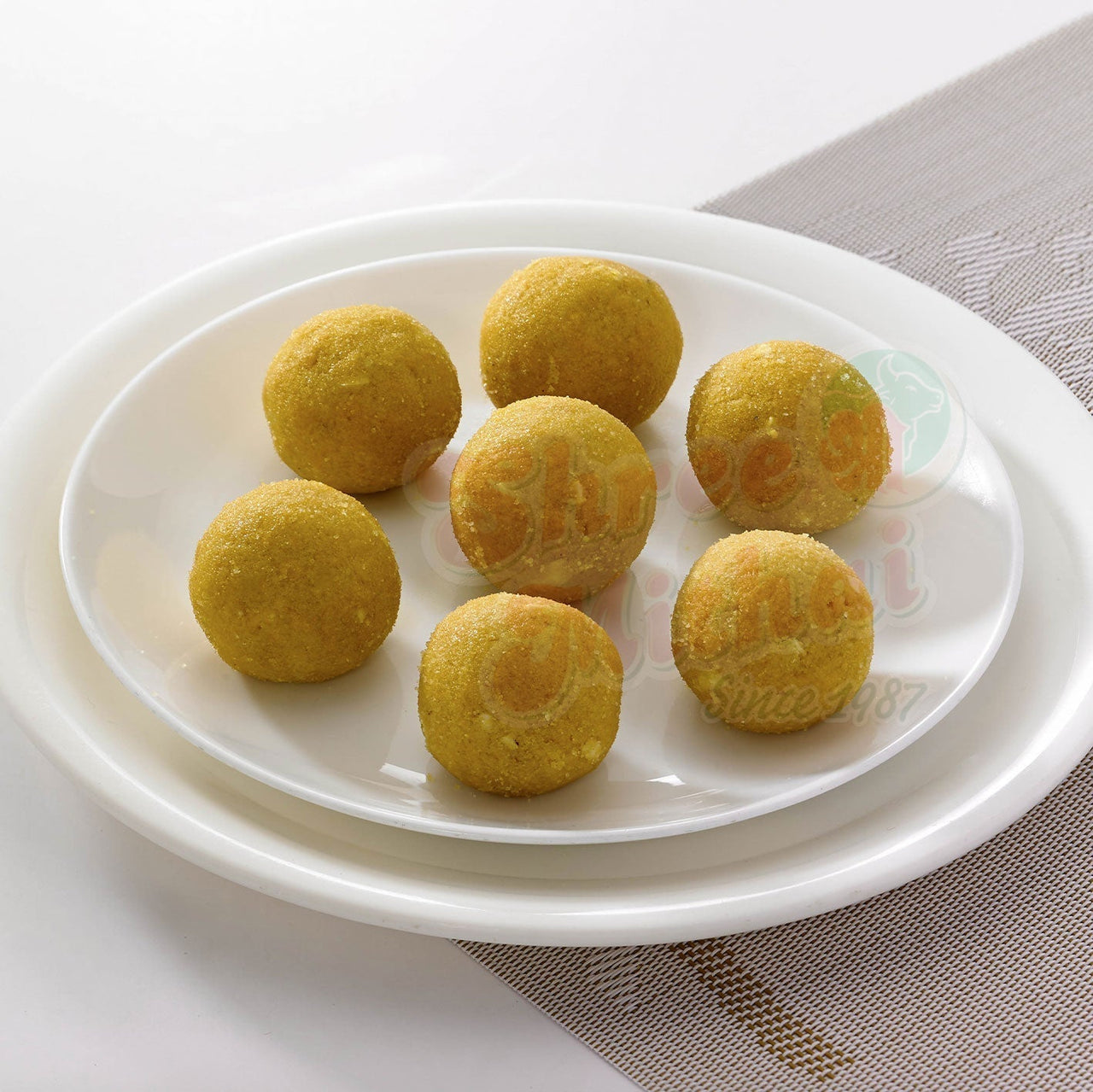 https://cdn.shopify.com/s/files/1/1857/6931/files/besan-ladoo-436445.jpg?v=1762168988
