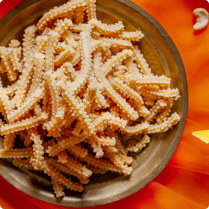 https://cdn.shopify.com/s/files/1/1857/6931/files/butter-murukku-714188.jpg?v=1762169454