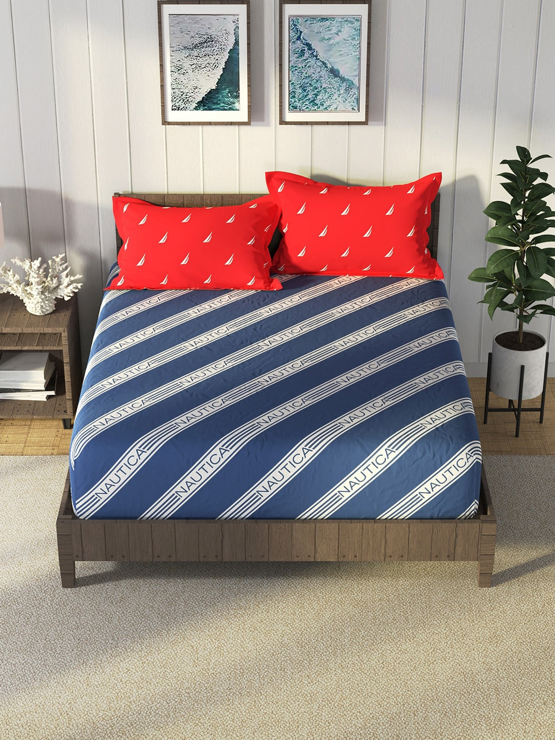 https://cdn.shopify.com/s/files/1/1857/6931/products/c2d6eaef-9abb-4056-b3b4-50fdfaf93f891683524352535NauticaBlueRedStripedCotton160TCKingBedsheetWith2PillowCover2.jpg?v=1703230045