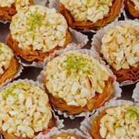 https://cdn.shopify.com/s/files/1/1857/6931/files/cashew-baklava-tart-2853276.jpg?v=1762168758