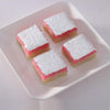 https://cdn.shopify.com/s/files/1/1857/6931/products/coconut_burfi_36_1.jpg?v=1623154767