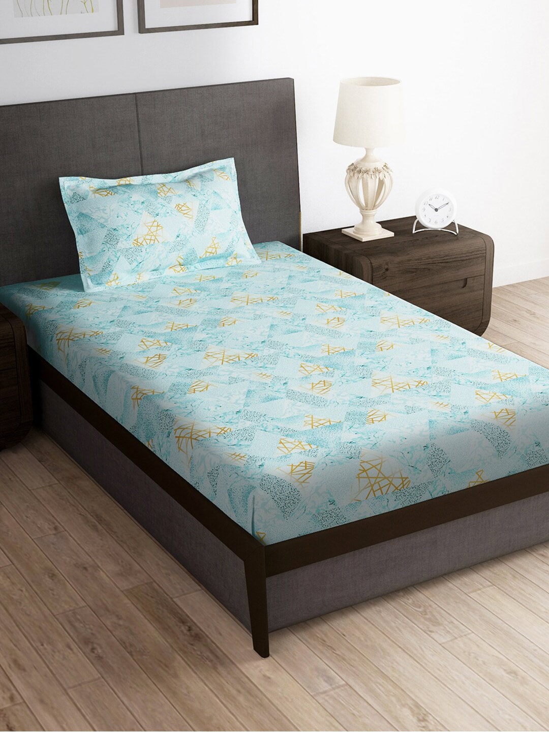 https://cdn.shopify.com/s/files/1/1857/6931/products/d107ddd3-830d-4875-b274-0bf24958e29e1690486773014LightBlue180TCAbstractSingleBedsheet1.jpg?v=1703220654