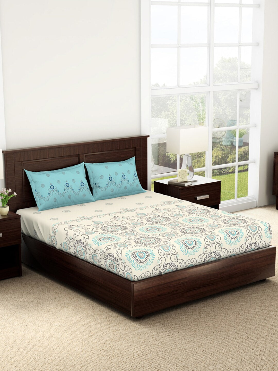 https://cdn.shopify.com/s/files/1/1857/6931/products/d140a1e2-aaca-49c7-af91-08cd7f36fd001682750849698SpacesReagalisViscoseCottonDoubleBedsheet-VanillaIce1.jpg?v=1703243835