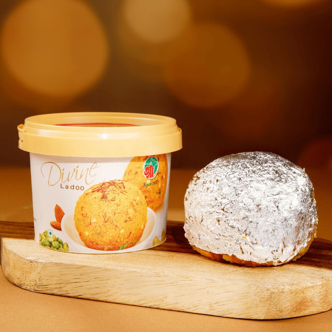 https://cdn.shopify.com/s/files/1/1857/6931/files/divine-ladoo-5487801.png?v=1762169047