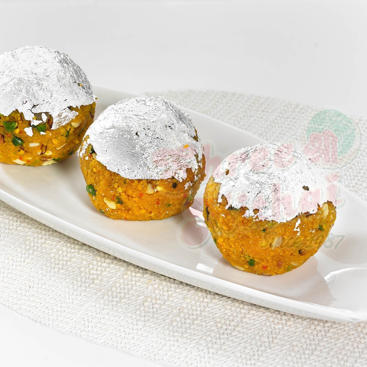 https://cdn.shopify.com/s/files/1/1857/6931/files/divine-ladoo-902675.jpg?v=1762169046