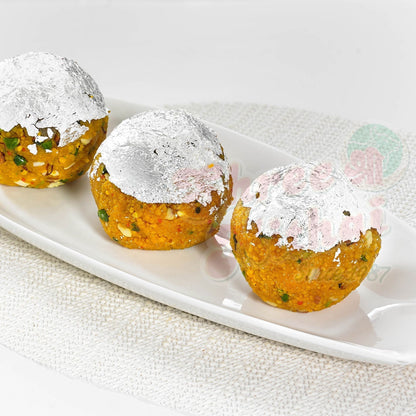 https://cdn.shopify.com/s/files/1/1857/6931/files/divine-ladoo-902675.jpg?v=1762169046