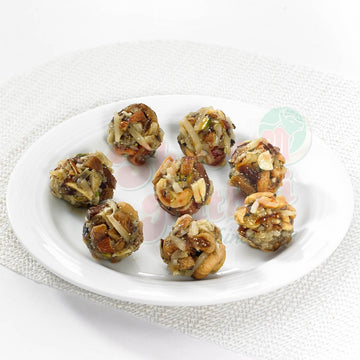 https://cdn.shopify.com/s/files/1/1857/6931/files/dry-fruit-ladoo-742511.jpg?v=1762169423